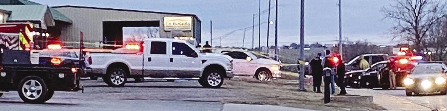 Police tape encircled the parking lot of TH Rogers Tuesday evening after an individual died after a report of shots fired. It is believed the incident is related to a homicide that took place earlier in the day at the Primavera Apartments.