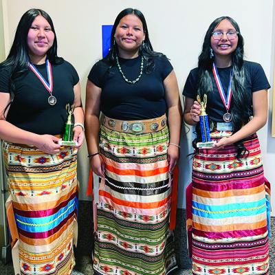 From left, Marley Gamboa, Araceli Chavez and AJ SpottedWolf placed first in the high school category of spoken language and third place in traditional song at the Oklahoma Native American Youth Fair. From left, Marley Gamboa, Araceli Chavez and AJ SpottedWolf placed first in the high school category of spoken language and third place in traditional song at the Oklahoma Native American Youth Fair.