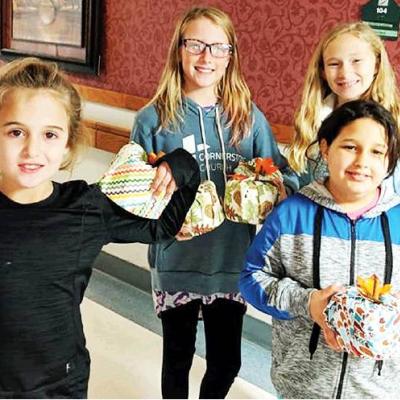 CDN | Courtesy Photo Girl Scouts pay a visit