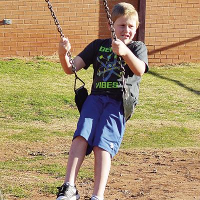 Mason Ringer enjoys his time on the swings at Southwest Elementary. CDN | Sam Goodwyn Mason Ringer enjoys his time on the swings at Southwest Elementary. CDN | Sam Goodwyn
