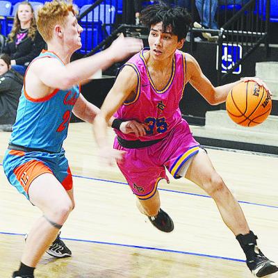 No. 35 D’Shawn Washee drives by a Calumet defender during Arapaho-Butler’s home game against the Chieftans. CDN | Sam Goodwyn No. 35 D’Shawn Washee drives by a Calumet defender during Arapaho-Butler’s home game against the Chieftans. CDN | Sam Goodwyn