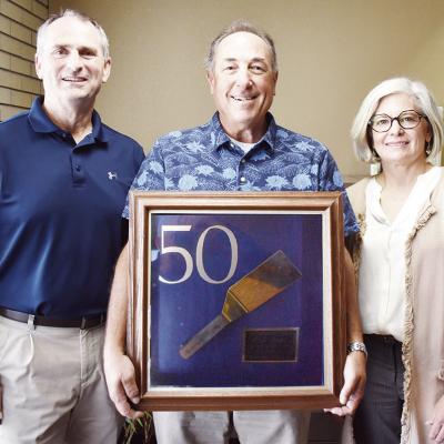 In 1997, Mitch Simon was presented a plaque from the Kiwanis Club of Clinton to commemorate his 50 years of service to the Club and its Pancake Day. Showing off the original plaque set to be displayed at this year’s Pancake Day, from left, are Kiwanis c Kiwanis Club celebrates 75 years of pancakes