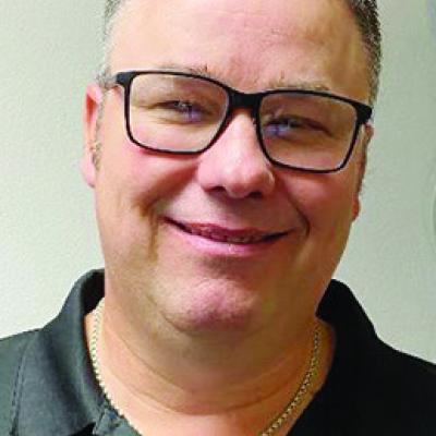 Past chair happy to serve