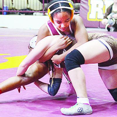 Clinton’s Peyton Clonce wraps her opponent up to avoid a single-leg takedown during the Hub City Wrestling Tournament held at the Tornado Dome. CDN | Sam Goodwyn Clinton’s Peyton Clonce wraps her opponent up to avoid a single-leg takedown during the Hub City Wrestling Tournament held at the Tornado Dome. CDN | Sam Goodwyn