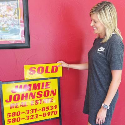 Shea Meget prepares a yard sign for a customer. CDN | Emily Stephens Pandemic led to new career for Shea Meget