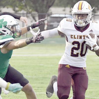 Kyn’Tavion Hill makes a man miss and runs for a first down during recent Red Tornado football action. CDN | John Kinsey Stiff-arming a defender