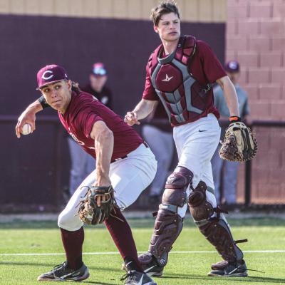 Caden Powell fields a bunt and throws out the Kingfisher runner while catcher Jackson Crumley watches the throw. Powell belted his eighth home run of the season in the Reds’ 11-1 rout of Kingfisher. CDN |Adam Ewing Reds exterminate Yellowjackets