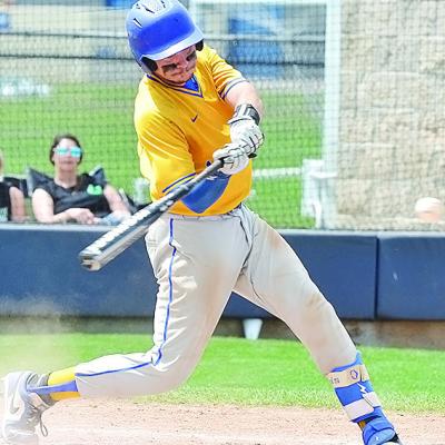 A-B’s Decker Davis attempts to swing at the ball Friday during the beginning of the Class A state semifinal against Amber-Pocasset in Shawnee. CDN | Sam Goodwyn Fighting to advance to the title game