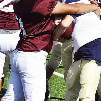 No. 51 Colton Pool wraps up the Kingfisher ballcarrier during Clinton’s seventh-grade game against the Yellowjackets near the start of the season. CDN | Sam Goodwyn OB& Ts Rising Stars