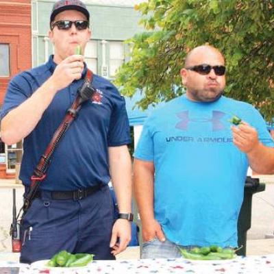 Struggling to make it through Saturday’s hot pepper-eating contest at the Route 66 Festival are Clinton fire fighter Dylan Abner of Clinton, third place winner, left; and Mike Rivera of Mangum, first place. Article Image Alt Text