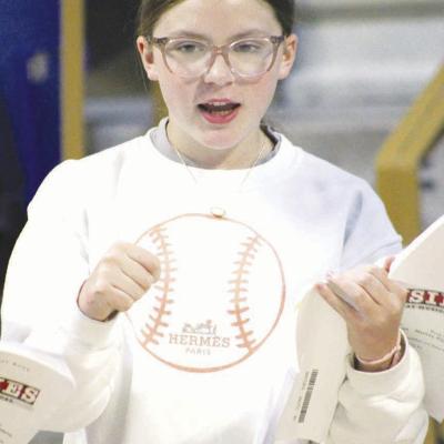 London House raises her hand, script in the other, while absorbing the words to the opening number during Southwest Playhouse “Newsies” summer rehearsals. CDN | Elisha Rangel Learning lyrics