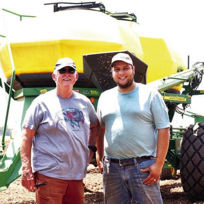 Joe Bill Hinz, left, stands with next generation of farmer Jimmy Funk. CDN | Caleb Blanchard Hinz ready to pass farming baton