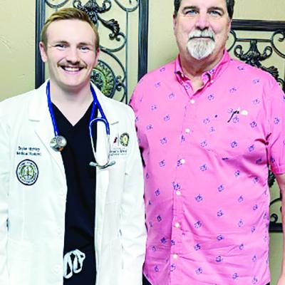 Pictured are Bryler Atchley, left, and Dr. Erick Derocher. CDN | Courtesy photo Shadowing Experience