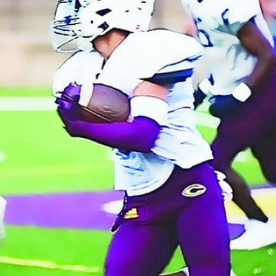 No. 8 Jaden Potter carries the ball during Clinton’s season-opening scrimage Friday against Anadarko. CDN | Sam Goodwyn Red Tornadoes host Anadarko in scrimmage