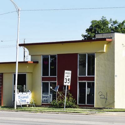 City assumes deed for Midtown Inn