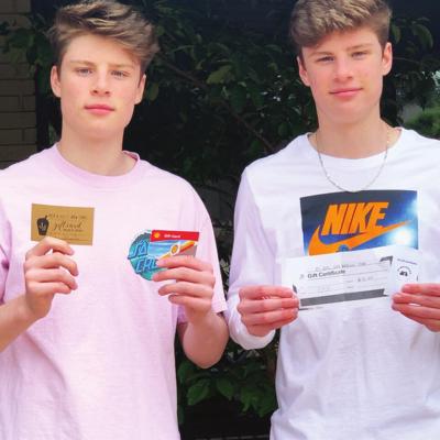 Clinton High School sophomores Harrison, left, and Jackson Crumley show off their rewards for being named in the top-10 percent in their class. CHS Top 10 Percent celebrated