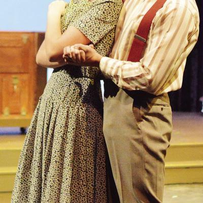Lily Adkinson, left, and Landon Tisdale share a dance during the Southwest Playhouse’s production of “Bright Star.” CDN | Micah Ashcraft Lily Adkinson, left, and Landon Tisdale share a dance during the Southwest Playhouse’s production of “Bright Star.” CDN | Micah Ashcraft