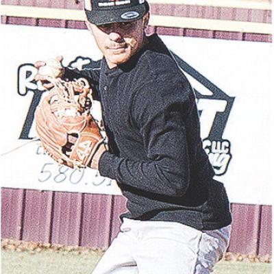 Clinton’s Jesus Gutierrez aims at first base before throwing the ball for an out during practice at the high school baseball field. CDN | Sam Goodwyn