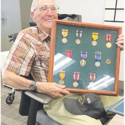 Veteran donates WWII service memorabilia to museum