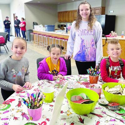 From left, Hazel Kauk, Claire Kreizenbeck, Audrey Kauk, and Maverick Kauk make Christmas-themed crafts during the annual Custer County 4-H Santa’s Workshop. CDN | Courtesy photo From left, Hazel Kauk, Claire Kreizenbeck, Audrey Kauk, and Maverick Kauk make Christmas-themed crafts during the annual Custer County 4-H Santa’s Workshop. CDN | Courtesy photo