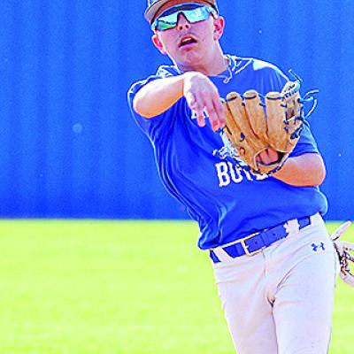 Arapaho-Butler’s Noah Cote hurls the ball toward first for the out during the Indians’ home game Monday against Clinton. CDN | Sam Goodwyn Arapaho-Butler’s Noah Cote hurls the ball toward first for the out during the Indians’ home game Monday against Clinton. CDN | Sam Goodwyn