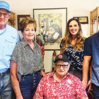 At age 82, Charles Belter still takes pride in selling used cars