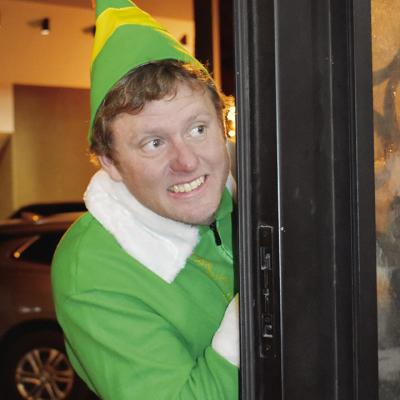 Buddy the Elf (James Burnam) looks for Christmas festivities during the 2021 Parade of Lights hosted by the Clinton Chamber of Commerce. CDN | Staff photo Festival of Lights Parade draws characters