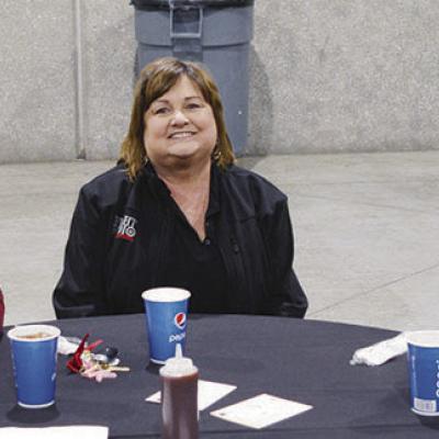 From left, Wright Wradio’s Krystal Blackwell, Teresa Kilho_er and Bart Royal enjoy the ambience at the Clinton Chamber of Commerce Luncheon. CDN | Michael Maresh