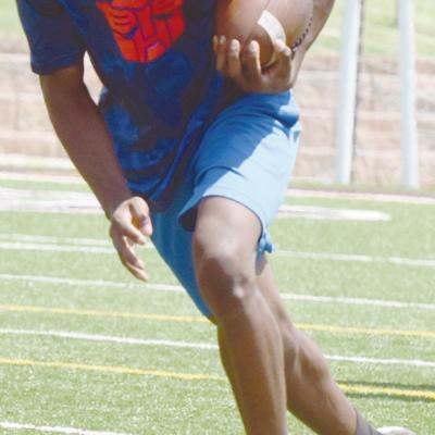 Darruis Hicks is praticing running the football during Spring Football practice recently. CDN | Josh Jennings CHS football will begin summer workouts Monday
