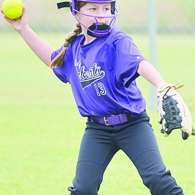 Hydro-Eakly’s Ava Abbott focuses on her target, as she prepares to throw the ball during the Bobcats’ game against Lexington to open the OK Kids 8U Softball State Tournament Wednesday at Schumacher Fields at Acme Brick Park. CDN | Sam Goodwyn Hydro-Eakly’s Ava Abbott focuses on her target, as she prepares to throw the ball during the Bobcats’ game against Lexington to open the OK Kids 8U Softball State Tournament Wednesday at Schumacher Fields at Acme Brick Park. CDN | Sam Goodwyn