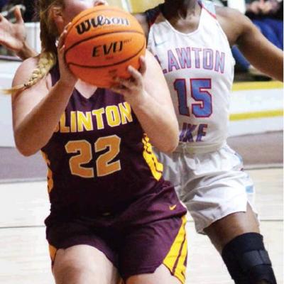 CDN | Collin Wieder Clinton senior Kayde Whitney lines up her shot against Lawton Eisenhower. Whitney is averaging around eight points per game. Whitney plays major part in program’s growth