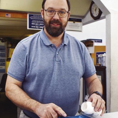 Scott Campbell fills a prescription at S&D Drug