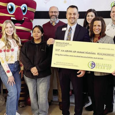 GEAR UP announced Monday the district has received a grant of $34.7 million to assist students who want to go to college. Front row, from left, are CHS Assistant Principal Rachel Ray, board members CaraLea Kreizenbeck and Kim Meacham, Clinton students Gra GEAR UP announced Monday the district has received a grant of $34.7 million to assist students who want to go to college. Front row, from left, are CHS Assistant Principal Rachel Ray, board members CaraLea Kreizenbeck and Kim Meacham, Clinton students Gra