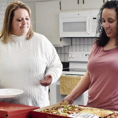 Erica Williams, co-pastor, and Adrena Tyler, secretary of The Crossing, prepared and served lunch for the Ministerial Alliance members prior to their meeting this week. The gathering took place at The Crossing Church, where the attendees enjoyed the meal Ministerial Alliance unites churches to serve