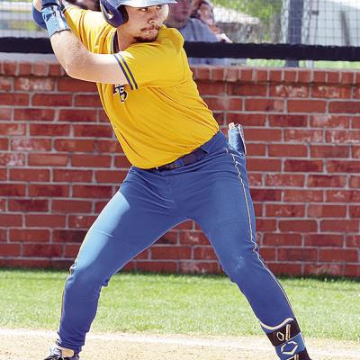 Arapaho-Butler’s Decker Davis stares down the pitcher during the Indians’ home game against Clinton in the spring season. CDN | Sam Goodwyn Arapaho-Butler’s Decker Davis stares down the pitcher during the Indians’ home game against Clinton in the spring season. CDN | Sam Goodwyn