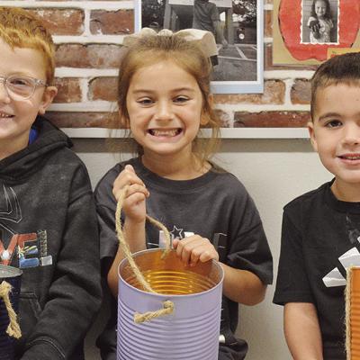 Arapaho-Butler kindergarteners, from left, Creek Dupree, Livi Salcido, and Carter Woodall show off their buckets that will be part of their booth setup for the Arapaho-Butler Carnival. CDN | Micah Ashcraft Arapaho-Butler kindergarteners, from left, Creek Dupree, Livi Salcido, and Carter Woodall show off their buckets that will be part of their booth setup for the Arapaho-Butler Carnival. CDN | Micah Ashcraft