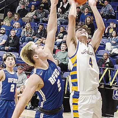 A-B’s Kaden Waldrop goes up for the layup while a BF-DC defender guards him Friday during the Indians’ home game. CDN | Sam Goodwyn