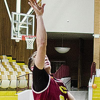 Clinton’s Wes Switzer goes up for a layup during practice in the Tornado Dome. CDN | Sam Goodwyn