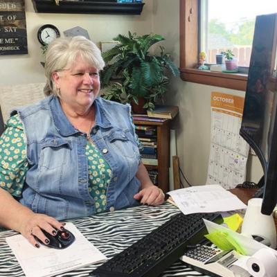 Robin Williams begins work on a monument design for a customer at Nicholson Monument. CDN | Emily Stephens Family has made its mark in Clinton for three generations