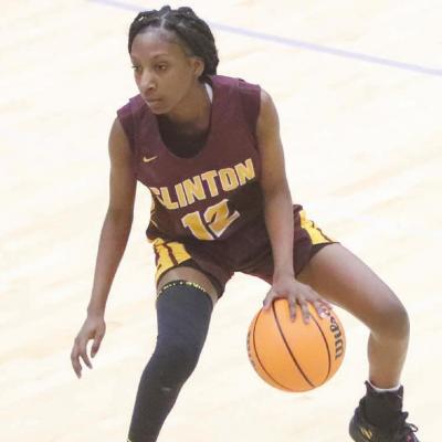 Carmella Jefferson joined the 1,000-point club during Clinton’s 43-38 victory Saturday afternoon over Booker T. Washington’s junior varsity. CDN | Adam Ewing Jefferson joins 1,000-point club, Lady Reds take consolation crown