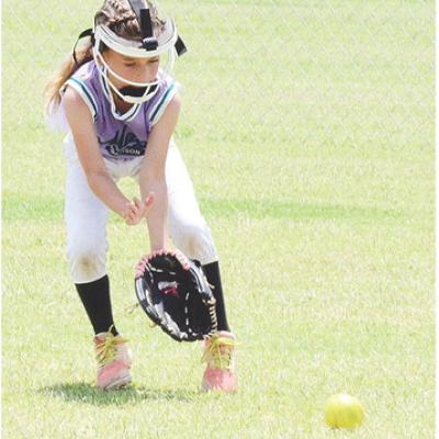 Morrison’s Adalynn Cotton charges at the ground ball during the Magic’s game against the Mooreland Wildcats Thursday in the OK Kids 8U State Softball Tournament at Schumacher Fields at Acme Brick Park. CDN | Sam Goodwyn Morrison’s Adalynn Cotton charges at the ground ball during the Magic’s game against the Mooreland Wildcats Thursday in the OK Kids 8U State Softball Tournament at Schumacher Fields at Acme Brick Park. CDN | Sam Goodwyn