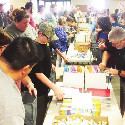 Churches collaborate on free school supplies