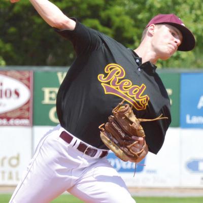 Clinton upcoming senior pitcher Jackson Crumley throws a strike in a game earlier this season. He started and pitched a four-inning shutout in a 24-0 win against Team 405 in the Guthrie Tournament opener Thursday. CDN | Collin Wieder Reds’ winning streak stays intact