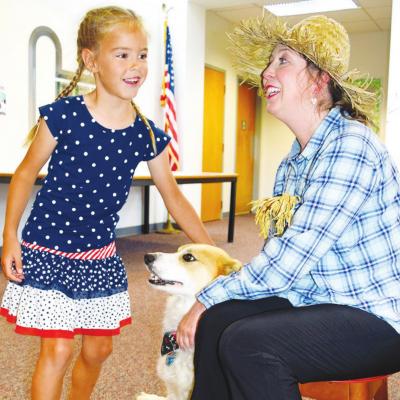 Kids enjoy dog tricks, stories