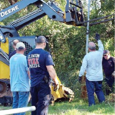 Fire fighters clean up rodeo grounds