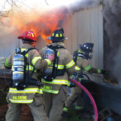 Clinton firefighters Forrest Valentine, John Denney and Dylon Kupka work to control a blaze that totally destroyed a mobile home Sunday at 1812 Littell Ave. CDN Photo Firefighters have busy weekend