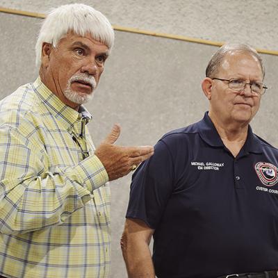 Dist. 1 Custer County Commissioner Wade Anders, left, speaks about Emergency Management Director Michael Galloway during his retirement party Friday at the Frisco Center. CDN | Micah Ashcraft