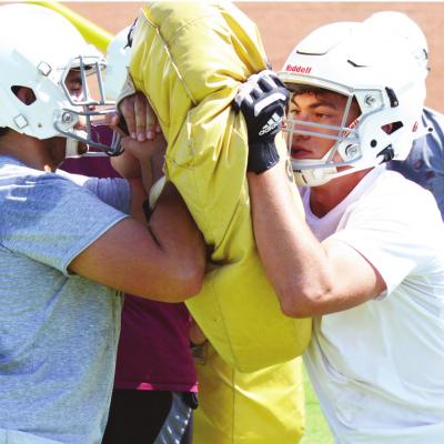 Reds show positives in first practices