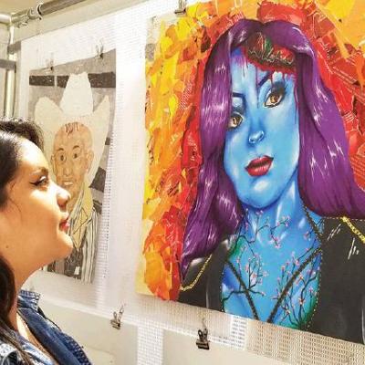 CDN | Robert S. Bryan Sophomore artist Silvia Pinedo views the self-portrait collage piece she created in her Clinton High School art class. Article Image Alt Text