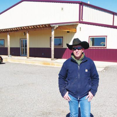 Owner/manager Brandon Hickey stands in front of the Western Oklahoma Livestock Auction sale barn. Sale barn changes hands